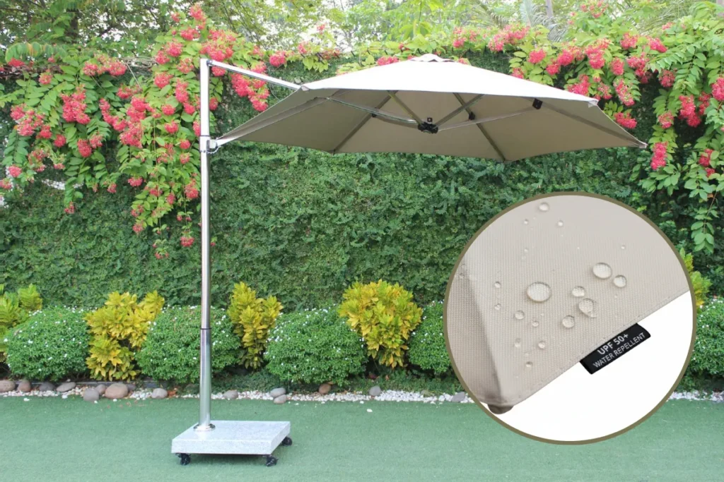 Hướng Dẫn Chọn Dù Quán Cafe Che Nắng Chất Lượng Cao 8 Cận cảnh bề mặt vải tán đẩy nước, đường may đôi và chỉ chống UV tăng tuổi thọ khi dùng ngoài trời.